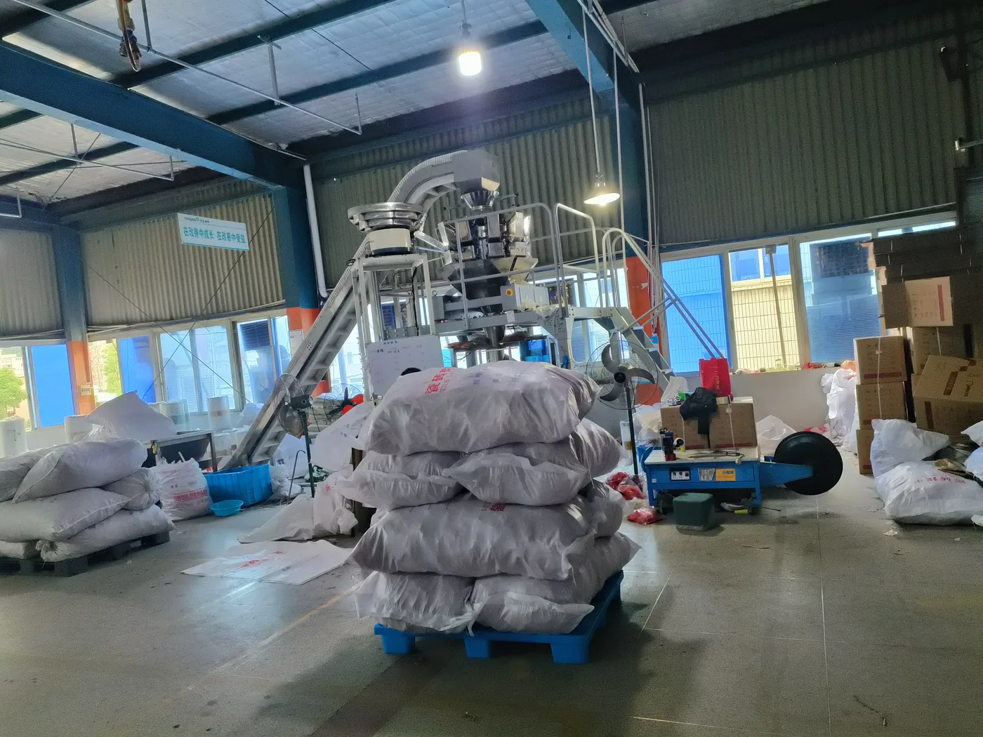 Packing and bagging equipment area in the Bensetimes factory